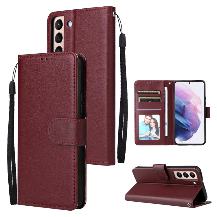 Burgundy leather phone case with three card slots, flip cover, and wrist strap.