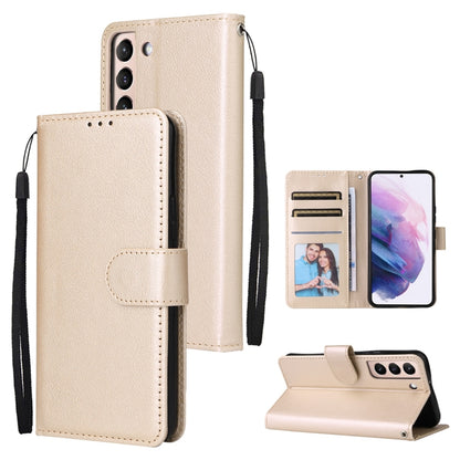 Gold-toned leather phone case with three card slots, flip cover, and wrist strap.