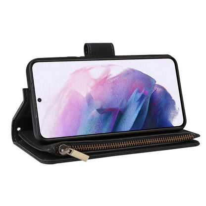 Black leather phone wallet case with zipper pouch, holding a phone