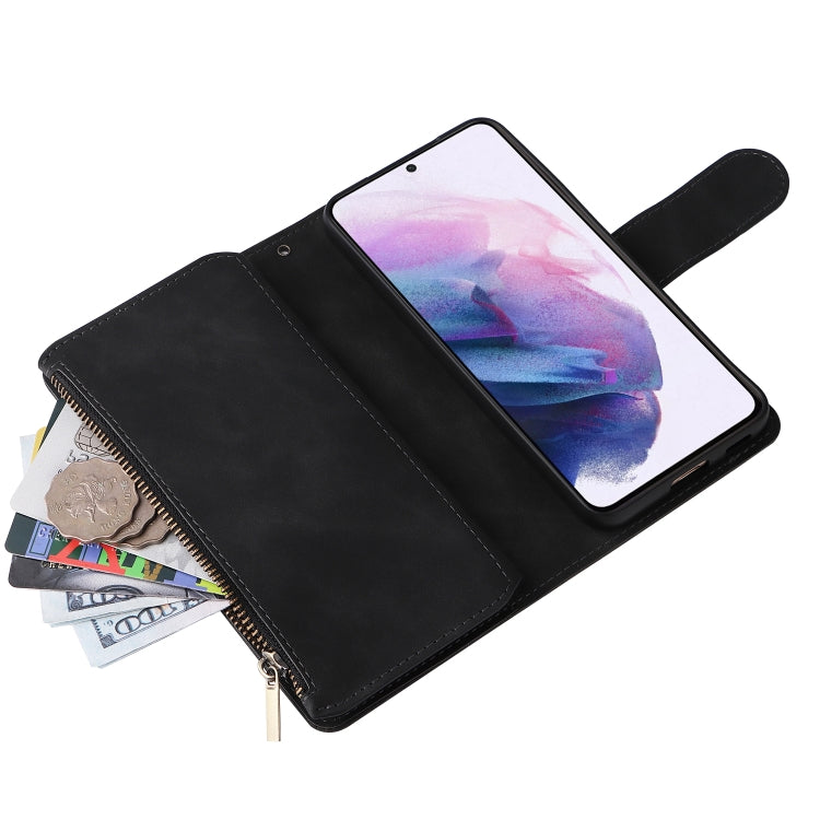 Black leather phone wallet case with zipper pouch, phone inside and wrist strap