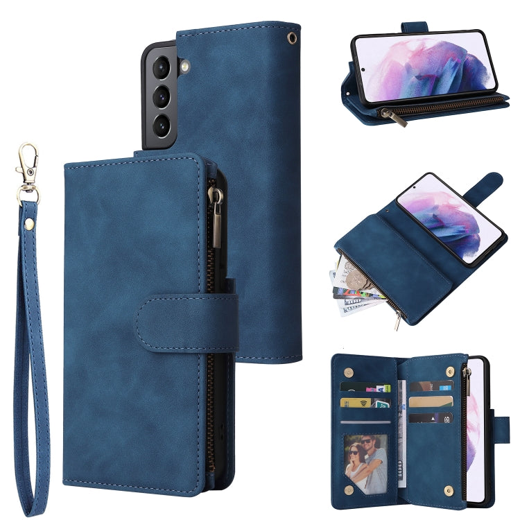 Blue leather wallet phone case with wrist strap, zipper pocket, and card compartments