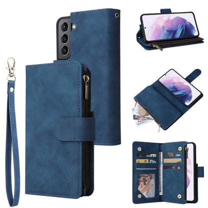 Blue leather wallet phone case with wrist strap, zipper pocket, and card compartments