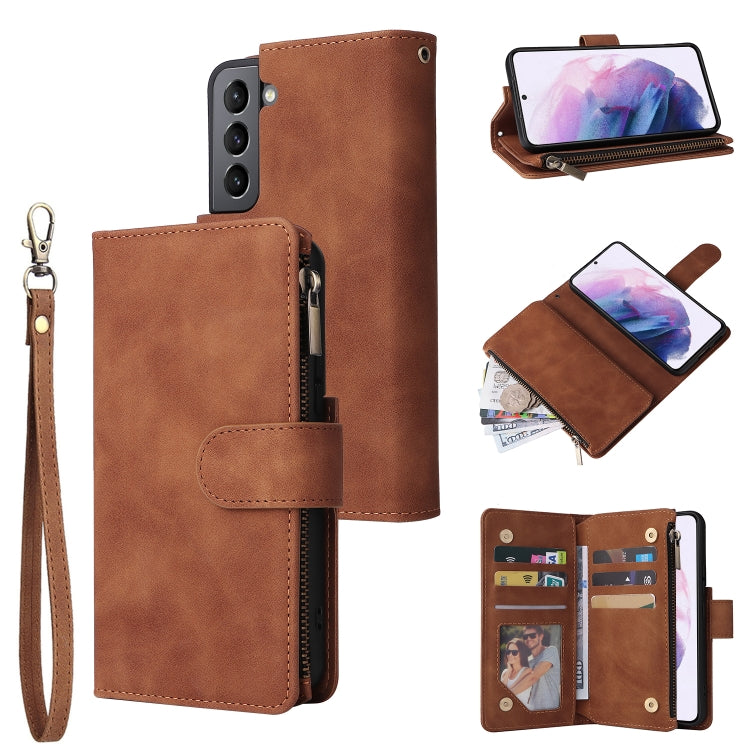 Brown leather phone wallet case with wrist strap, zipper, and card slots