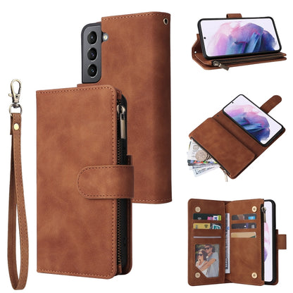 Brown leather phone wallet case with wrist strap, zipper, and card slots