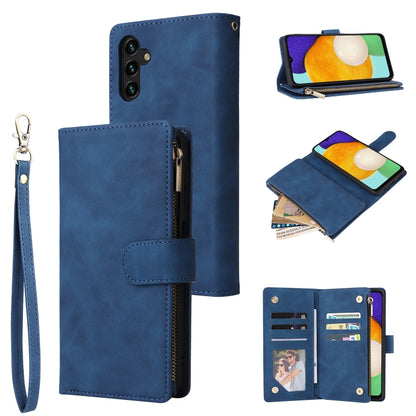 Blue leather wallet phone case with wrist lanyard, zip pouch, and card holder panel