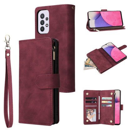 Wine red leather phone wallet case with wrist strap, zipper closure, and snap card holder