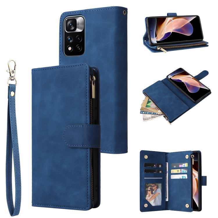 Blue leather wallet phone case with wrist strap, zipper closure, and card slots