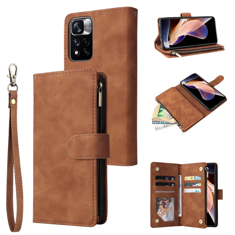 Brown leather phone wallet case with wrist strap, front flap, zipper closure, card slots