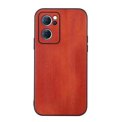Textured PU phone case in red-orange, rear view with camera cutouts