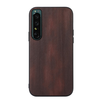 Textured PU phone case in dark brown with camera cutout and button-side openings