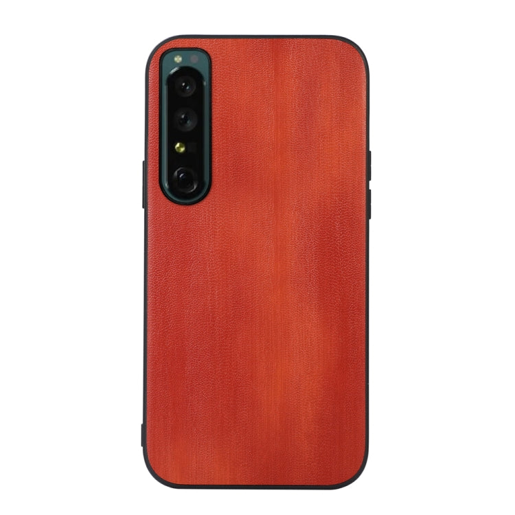 Textured PU phone case in red-orange, rear with vertical camera module cutout