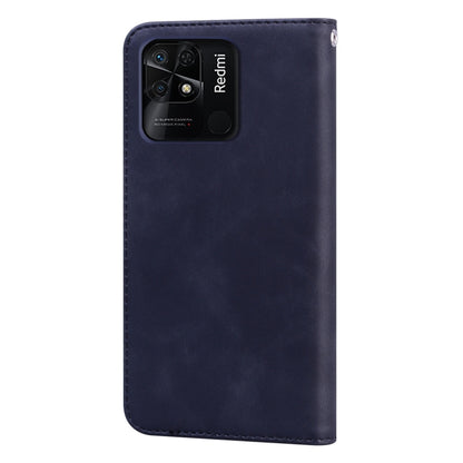 Dark blue leather phone case with camera cutout and raised stitched edges
