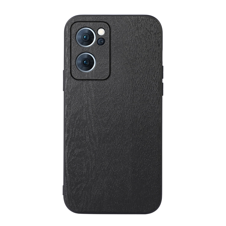 Wood-texture PU phone case in black, single back view with camera module cover