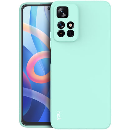 Light cyan TPU phone case with camera cutouts and raised edge for phone screen protection