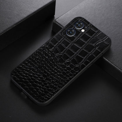Black croc-texture genuine leather phone case lying at an angle, camera openings visible