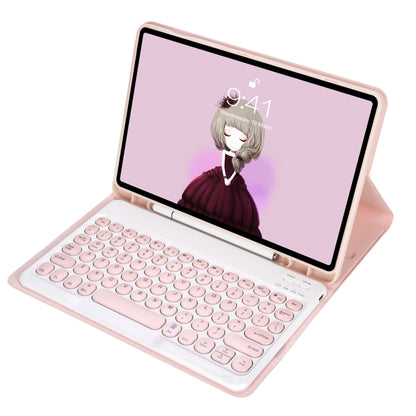 Pink Bluetooth keyboard case with round keycaps, tablet propped up at an angle