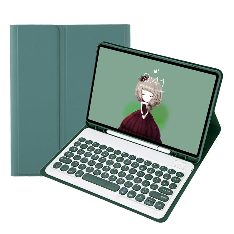Dark green Bluetooth keyboard case with round keycaps and tablet propped on stand