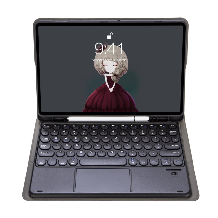Black Bluetooth keyboard leather case with touchpad and keycaps, tablet docked in front