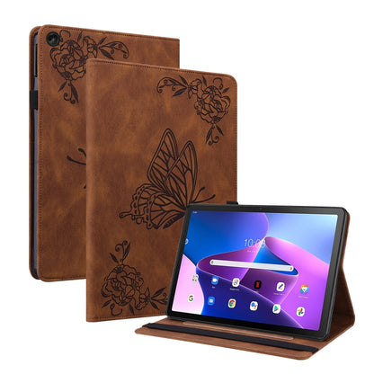 Brown butterfly-and-flower embossed leather tablet case, front cover open on stand