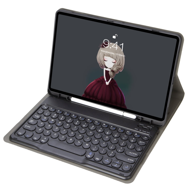 Black leather keyboard case with round keycaps, tablet in folio stand