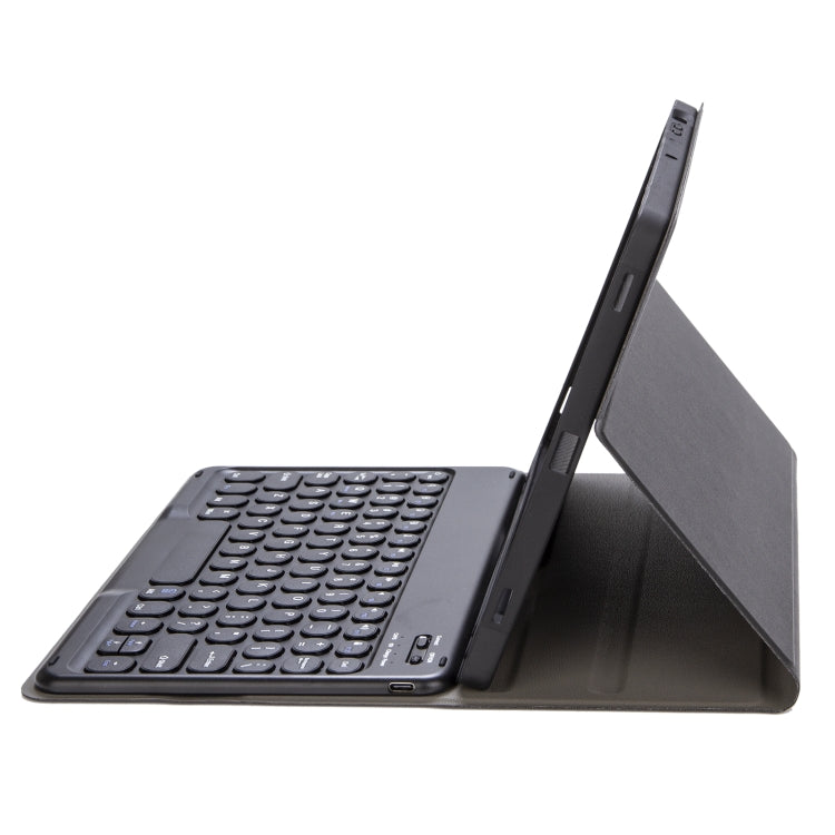 Dark leather keyboard case with round keycaps and angled folio stand