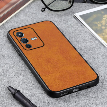 Two-tone textured shockproof phone case, brown; raised camera bezel and contoured edges