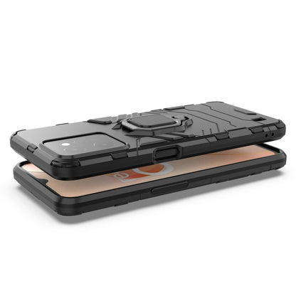 Black magnetic ring holder phone case, top view with port openings and raised cover