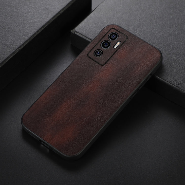 Textured PU phone case in dark brown, with triple camera cutout on the back