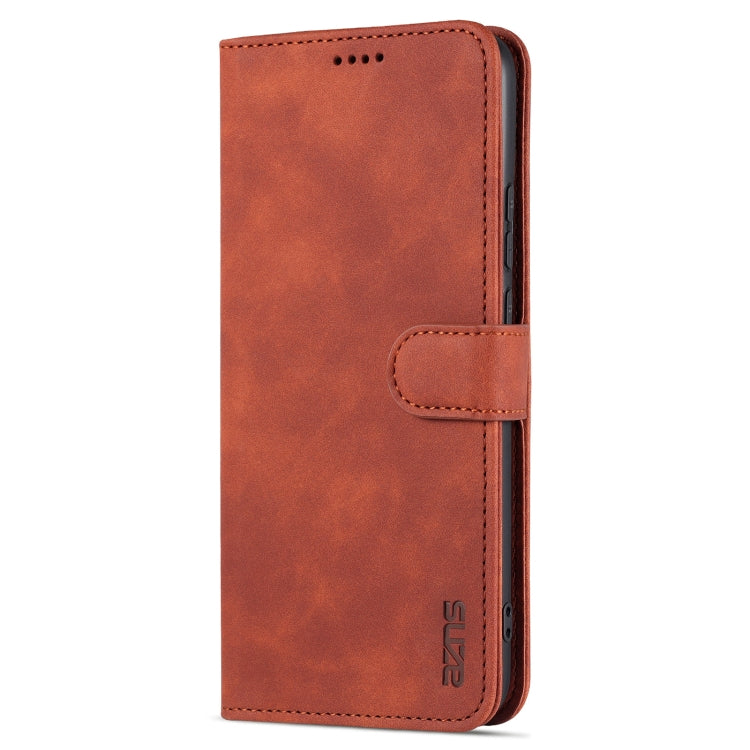 Brown leather flip phone case with side wallet flap, visible stitching, and logo panel.