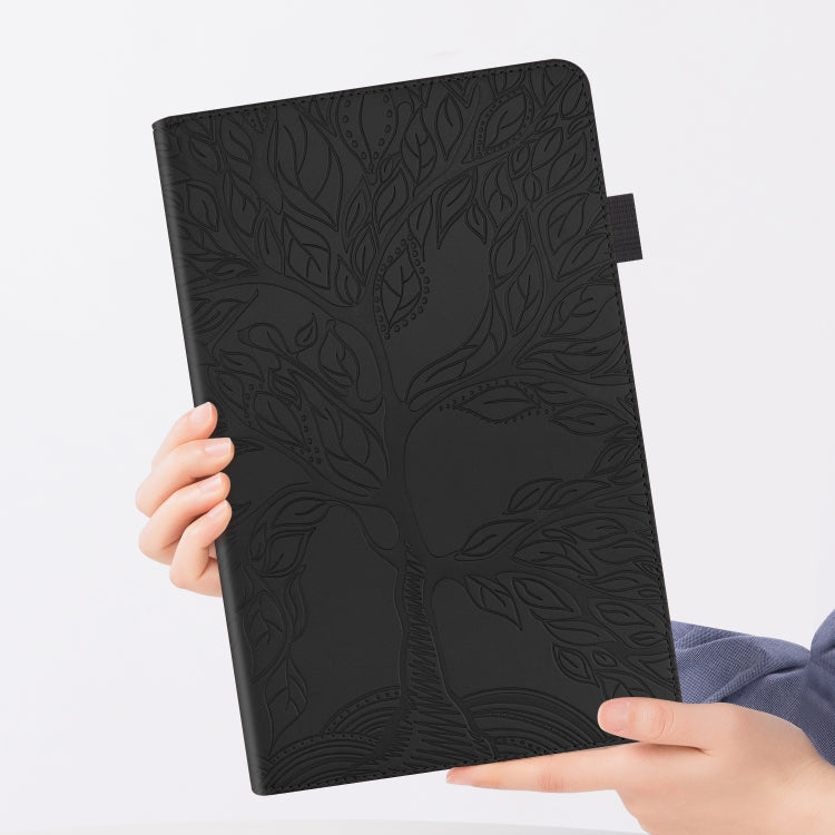 Black embossed leaf leather flip tablet case held in hands