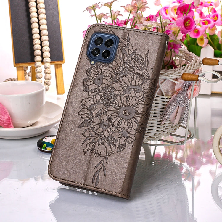 Embossed butterfly phone wallet case with wrist strap, grey