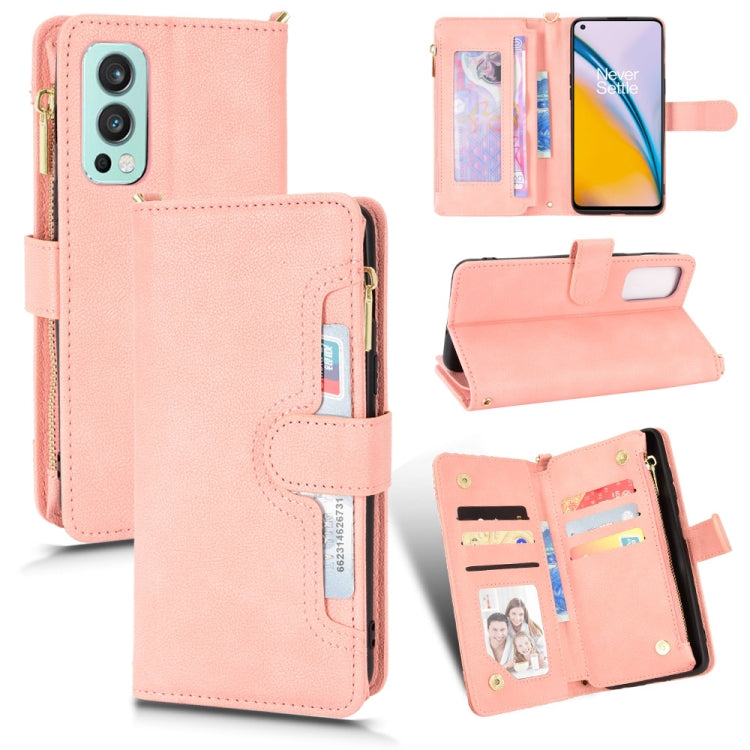 Pink litchi-textured leather phone case with zipper wallet flap and multi-card holder