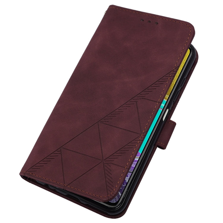 Wine red embossed flip leather phone case angled view with side button cutouts