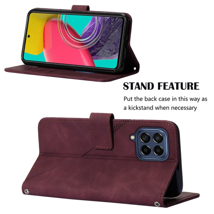 Wine red embossed flip leather phone case with stand-style flip and crossbody strap