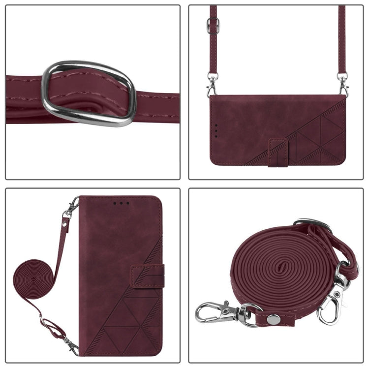 Wine red leather crossbody phone case details: metal ring, strap, and embossed panel