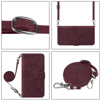 Wine red leather crossbody phone case details: metal ring, strap, and embossed panel