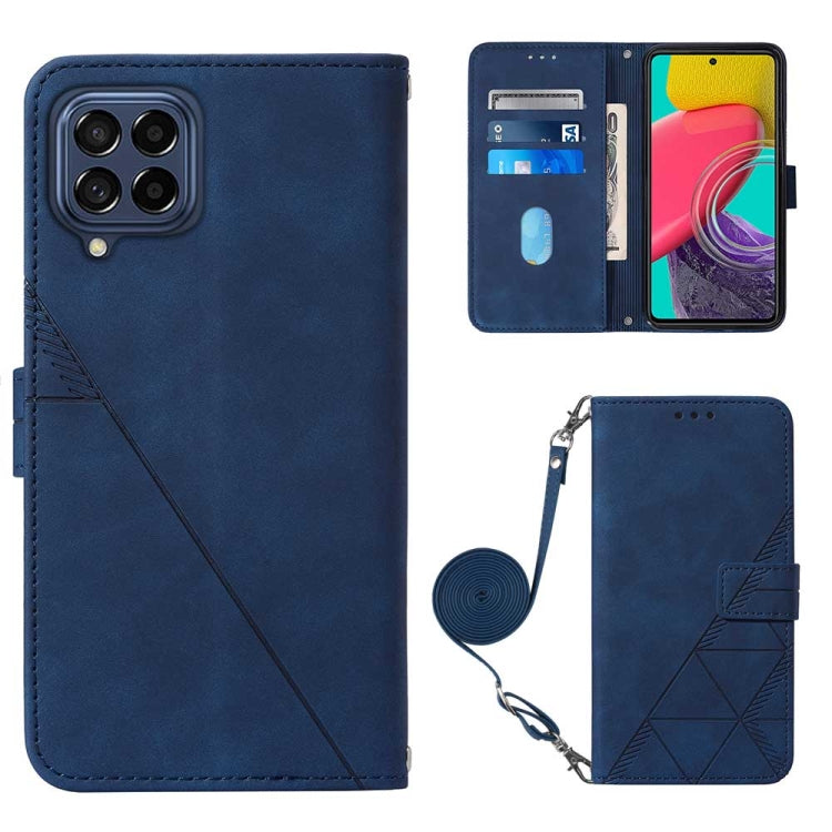 Blue flip leather phone case with crossbody strap and embossed diagonal panel.