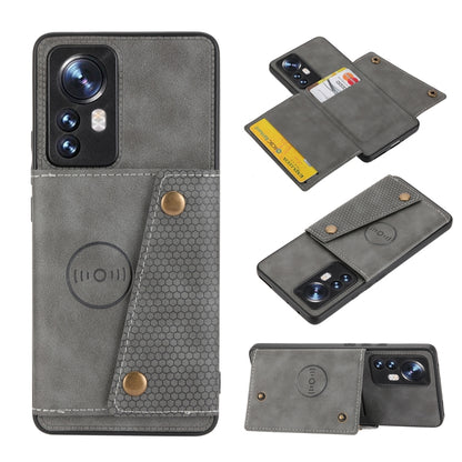 Gray magnetic wallet-style phone case with double buckle and card slot flap