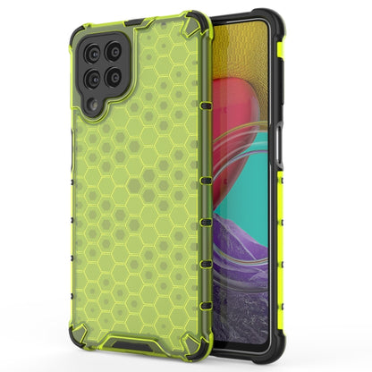 Green honeycomb shockproof phone case with camera cutouts and raised bumper