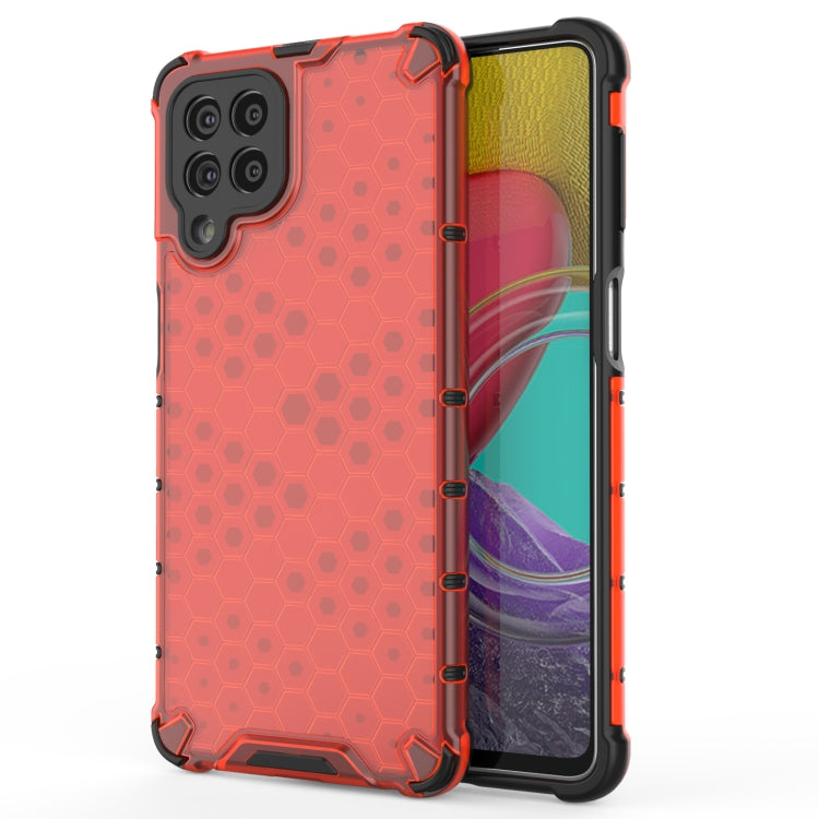 Shockproof honeycomb phone case in red/orange with TPU bumper and raised camera openings