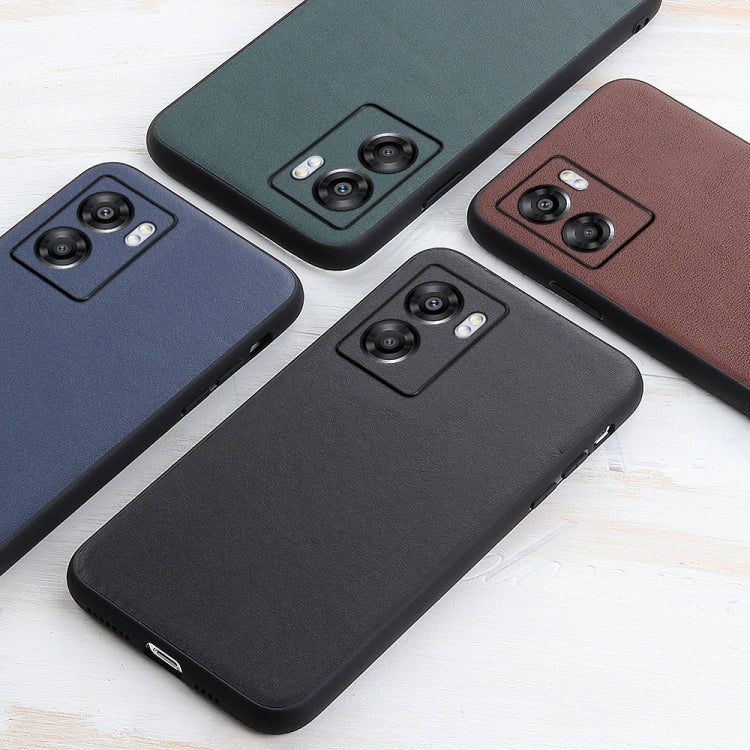 Genuine leather phone case set in dark blue, teal, and brown with camera cutouts