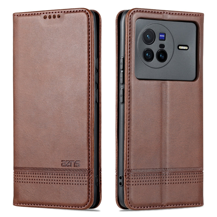 Dark brown flip phone case with camera cutout and stitched magnetic closure