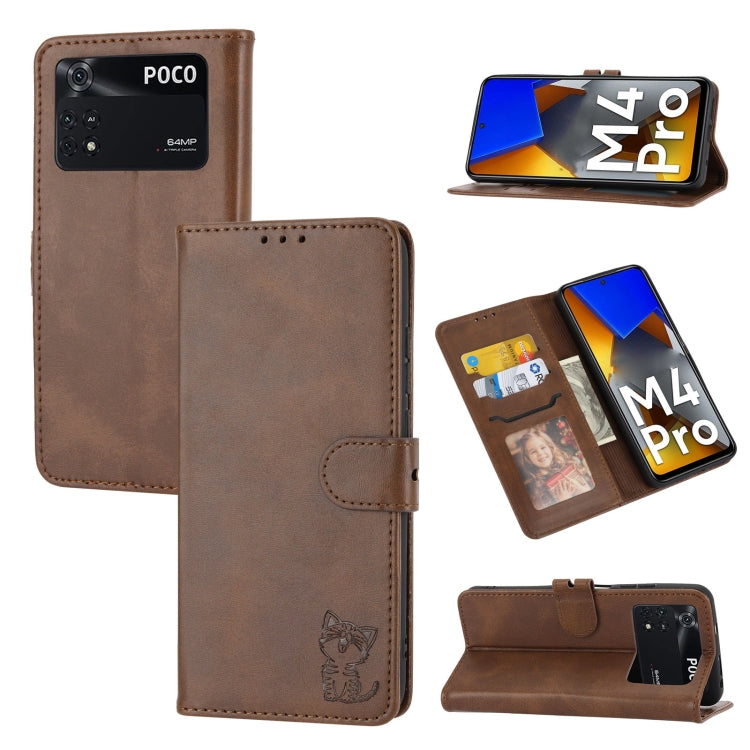 Tan embossed cat pattern leather wallet phone case with flip cover, strap, and card holder