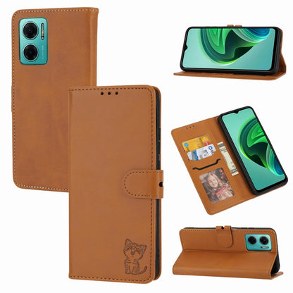 Camel embossed cat pattern leather wallet phone case with flip cover, strap, and card holder