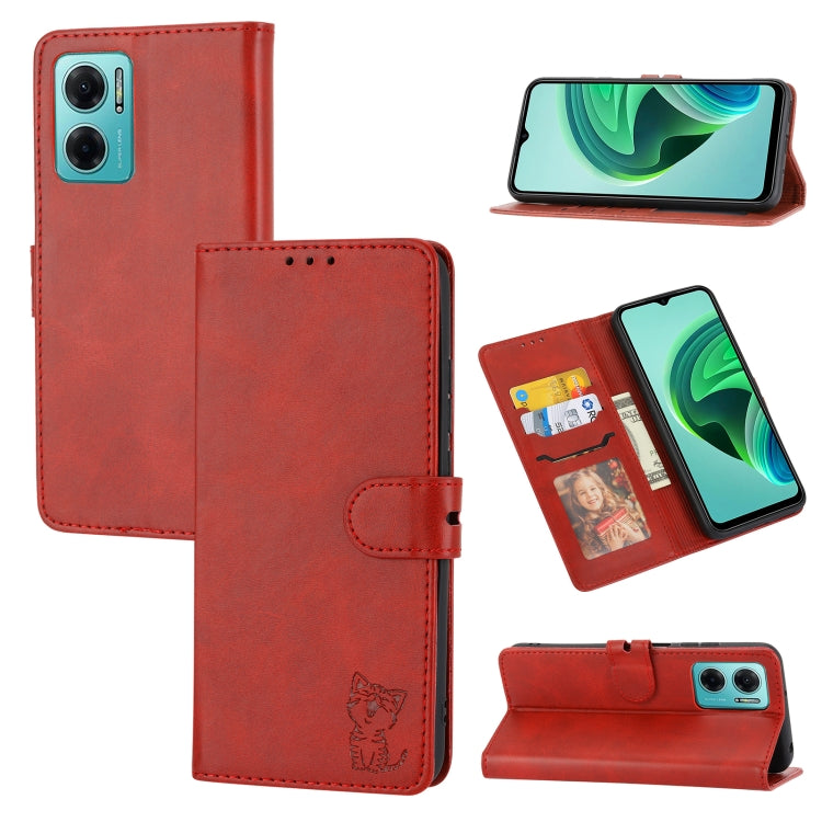 Red embossed cat pattern leather wallet phone case with flip cover, strap, and card holder