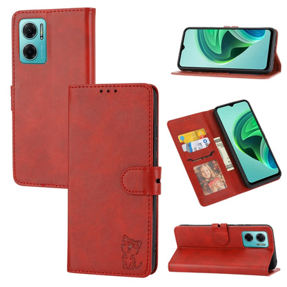 Red embossed cat pattern leather wallet phone case with flip cover, strap, and card holder