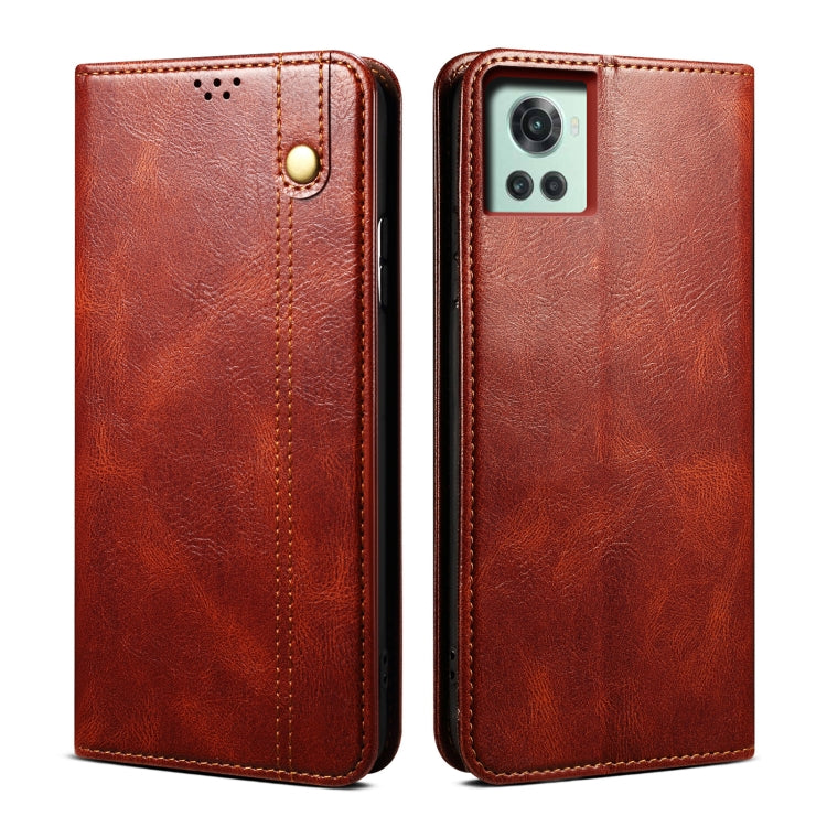 Crazy horse leather phone case with camera cutout, brown finish, gold tone button detail