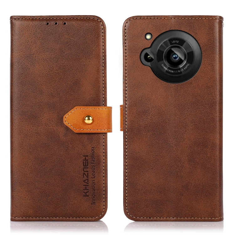 Brown cowhide-texture flip leather phone case with orange button strap and camera cutout