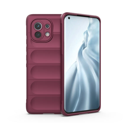 Wine red protective smartphone case with camera cutouts and raised lip