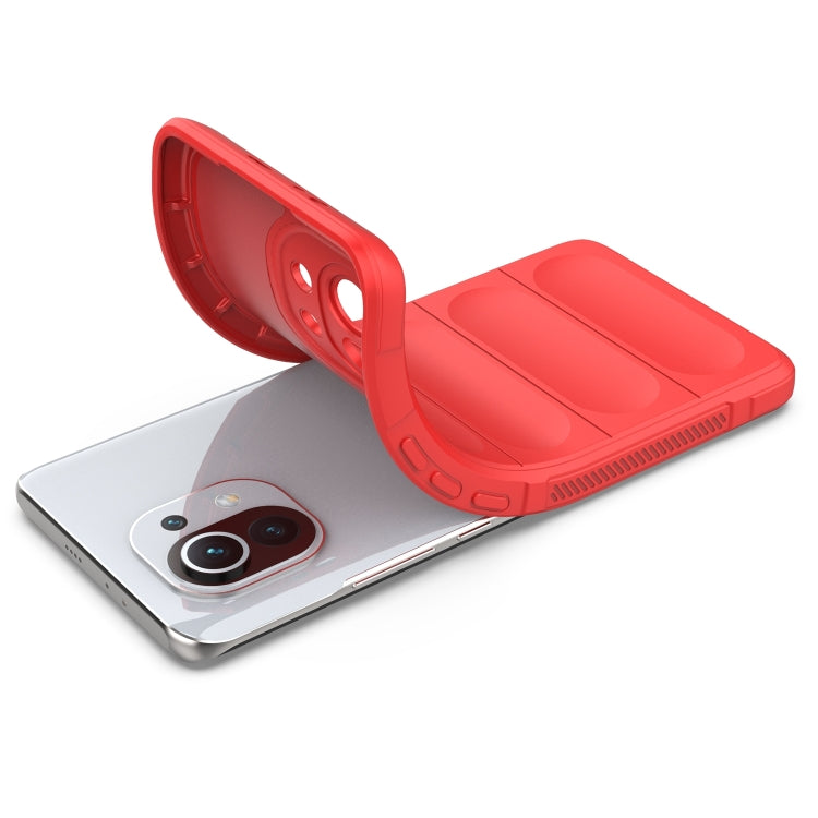 Red protective phone case with hinged cover and camera opening